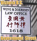 Larry Wong, Canada immigration services lawyer and assistant speak Cantonese Chinese Signage