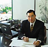 Jeffrey S. Lowe, Business Immigration lawyer in office overlooking False Creek in Vancouver